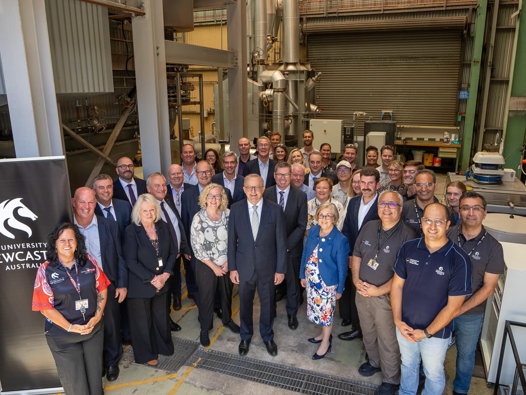 Prime Minister Anthony Albanese alongside personnel from the University of Newcastle