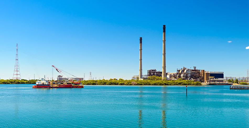 View across water to coal-fired power station