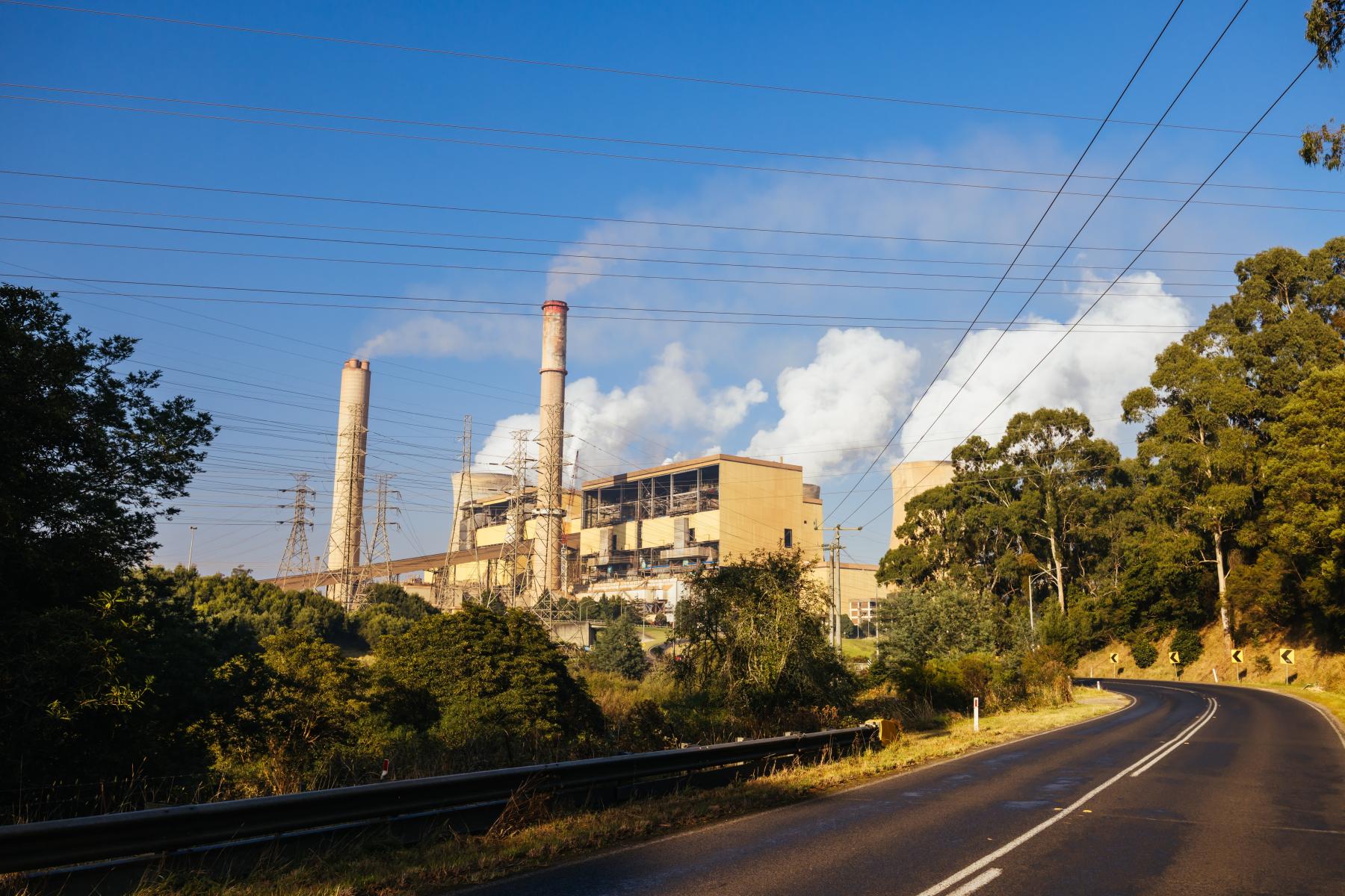A power station with smoke stacks