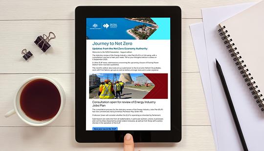iPad with the Journey to net zero newsletter on the screen