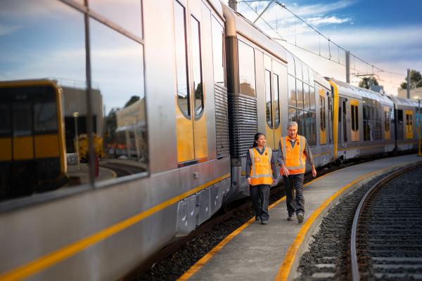 rain Drivers Walking through the Stabling Yard at Mortdale Maintenance Centre